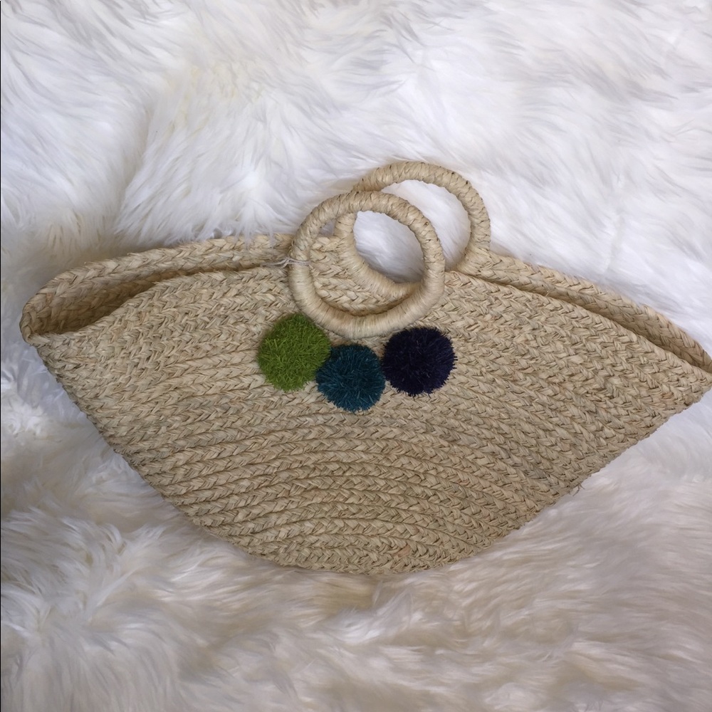 Pom Pom Handmade Straw Bag. Spacious inside.